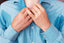hyperhidrosis treatment options for man in blue shirt sweating