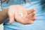person holding hyperhidrosis medication in their hands