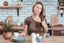 woman sweating too much in her kitchen